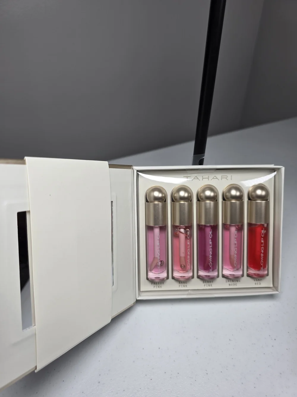 Tahari Glowing Lip Oil Set — Pick 1
